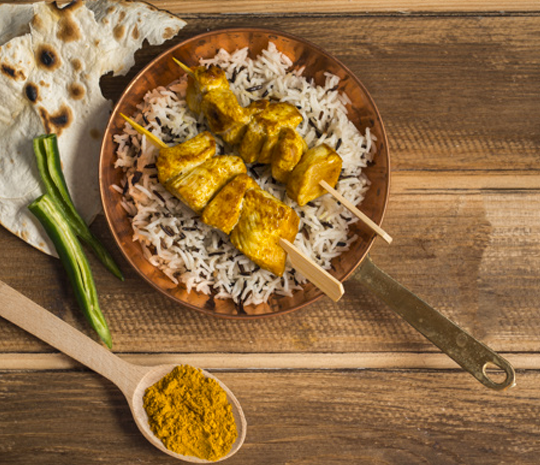 Ricetta pollo al curry in salsa al cocco Molino Spadoni